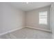 Bedroom with carpet and multiple windows at 14261 Crest Palm Ave, Windermere, FL 34786