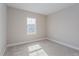 Bright bedroom with carpeted floors and a window at 14261 Crest Palm Ave, Windermere, FL 34786