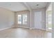 Bright and spacious living room with hardwood floors and lots of natural light at 14261 Crest Palm Ave, Windermere, FL 34786