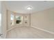 Well-lit bedroom with bay window and light flooring at 1514 Vandam St, The Villages, FL 32162