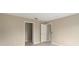 Spacious bedroom with a walk-in closet and light flooring at 1514 Vandam St, The Villages, FL 32162