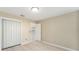 Bright bedroom with light flooring and view of kitchen at 1514 Vandam St, The Villages, FL 32162