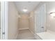 Walk-in closet with double hanging rods at 1514 Vandam St, The Villages, FL 32162