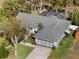 Aerial view of single-Gathering home with a large screened patio at 15729 Greater Groves Blvd, Clermont, FL 34714