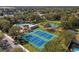 Aerial view of community pool and courts at 15729 Greater Groves Blvd, Clermont, FL 34714