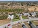 Aerial view of residential neighborhood with single Gathering home at 15729 Greater Groves Blvd, Clermont, FL 34714