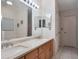 Bright bathroom with double sinks and granite countertop at 15729 Greater Groves Blvd, Clermont, FL 34714