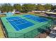 Two community tennis courts at 15729 Greater Groves Blvd, Clermont, FL 34714