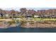 Distant view of a lakefront property, showcasing a private dock and serene setting at 1702 N County Road 452, Eustis, FL 32726