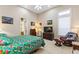 Bright bedroom with tile flooring, a ceiling fan, and decor at 1825 Myrtle Lake Ave, Fruitland Park, FL 34731