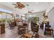 Spacious main bedroom with windows providing ample natural light and tile flooring at 1825 Myrtle Lake Ave, Fruitland Park, FL 34731