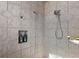 Shower featuring chrome fixtures, body jets, and a built-in niche for storage at 1825 Myrtle Lake Ave, Fruitland Park, FL 34731