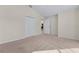 Bedroom with carpeted floor, ceiling fan, and closet at 2017 Royal Elm Rd, The Villages, FL 32162