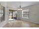 Dining room with sliding glass door and lots of natural light at 2017 Royal Elm Rd, The Villages, FL 32162