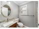 Small bathroom with single vanity and toilet at 2222 Southwood Dr, The Villages, FL 32162