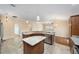 Spacious kitchen with large island and plenty of cabinet space at 2222 Southwood Dr, The Villages, FL 32162