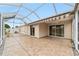 Spacious covered patio with patterned flooring at 2222 Southwood Dr, The Villages, FL 32162