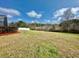 Large backyard with open space and natural surroundings at 225 Sutherland Ct, Apopka, FL 32712