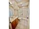 Bathroom with single vanity, toilet, and shower at 225 Sutherland Ct, Apopka, FL 32712