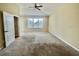 Large bedroom with carpeted floors and neutral walls at 225 Sutherland Ct, Apopka, FL 32712