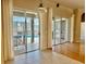 Breakfast nook with sliding doors leading to the pool area at 225 Sutherland Ct, Apopka, FL 32712