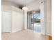 Dining area with sliding glass doors providing natural light and views to the screened pool area at 225 Sutherland Ct, Apopka, FL 32712