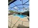 Inviting screened pool and spa with tranquil views at 225 Sutherland Ct, Apopka, FL 32712