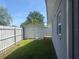 Backyard shed with a privacy fence adding a practical storage solution at 2384 Orange Capital Ct, Eustis, FL 32726