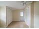 Sunlit room features two large closets and neutral flooring creates a versatile and inviting space, ready for personalization at 2384 Orange Capital Ct, Eustis, FL 32726