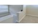 Bright bedroom boasts natural light and neutral walls creating a serene retreat for relaxation and rest at 2384 Orange Capital Ct, Eustis, FL 32726