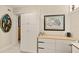 Hallway features sleek storage solutions and modern accents with a decorative piece of artwork hung on the wall at 2384 Orange Capital Ct, Eustis, FL 32726