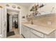 Cozy kitchen with white cabinets, tile backsplash, and modern appliances at 2384 Orange Capital Ct, Eustis, FL 32726