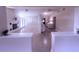 Bright living room with fireplace, white trim and open floor plan perfect for entertaining at 2384 Orange Capital Ct, Eustis, FL 32726