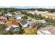 Aerial view of houses with a pool and lush landscaping at 25324 Hibiscus St, Leesburg, FL 34748