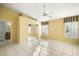 Spacious bedroom with tile floors and mirrored closet doors at 25324 Hibiscus St, Leesburg, FL 34748