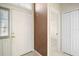 Front entry with door and coat closet at 25324 Hibiscus St, Leesburg, FL 34748