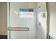 Clean shower with glass enclosure and window at 25324 Hibiscus St, Leesburg, FL 34748