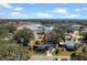 Aerial view showcasing home's location near a lake at 25547 Belle Helene, Leesburg, FL 34748