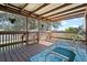 Relaxing screened porch with wooden deck and water views at 25547 Belle Helene, Leesburg, FL 34748