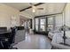 Inviting sunroom features bright natural light, tile floors and versatile space for an office or relaxation area at 25547 Belle Helene, Leesburg, FL 34748
