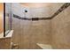 Large walk-in shower with tile surround and built-in seat at 27008 Camerons Run, Leesburg, FL 34748