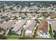 Aerial view of houses in a residential neighborhood at 2849 Leicester Ter, The Villages, FL 32162