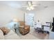 Home office with built-in desk and comfortable seating at 2849 Leicester Ter, The Villages, FL 32162