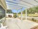 Relaxing patio with pergola and golf course view at 2849 Leicester Ter, The Villages, FL 32162