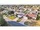 Residential neighborhood showcasing well-maintained homes with mature landscaping from an aerial view at 3319 Thorncrest Dr, The Villages, FL 32162