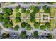 Aerial shot of the community with lush landscaping, orderly parking, and charming gazebo at 3480 Soho St # 206, Orlando, FL 32835