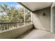 Relax in the comfort of this shaded balcony, perfect for enjoying the fresh air and natural scenery at 3480 Soho St # 206, Orlando, FL 32835