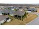 Aerial view of a house and surrounding neighborhood at 3769 Causey Ct, The Villages, FL 32163