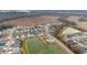 Aerial view of houses around two ponds in a residential area at 3769 Causey Ct, The Villages, FL 32163