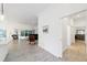 Open concept hallway leading to living room and bedroom at 3769 Causey Ct, The Villages, FL 32163